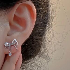 Bow stud earrings A1087
